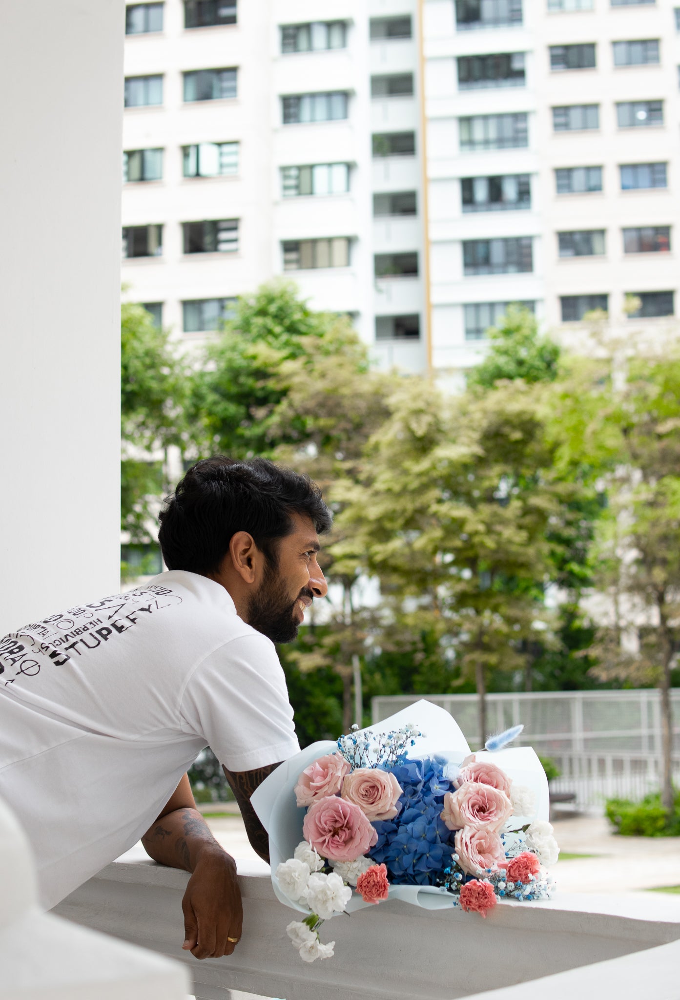 Rustique Flora blue flower and rose bouquet for delivery in Singapore